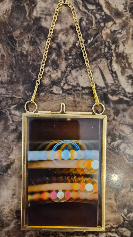 Diffraction art print in locket frame