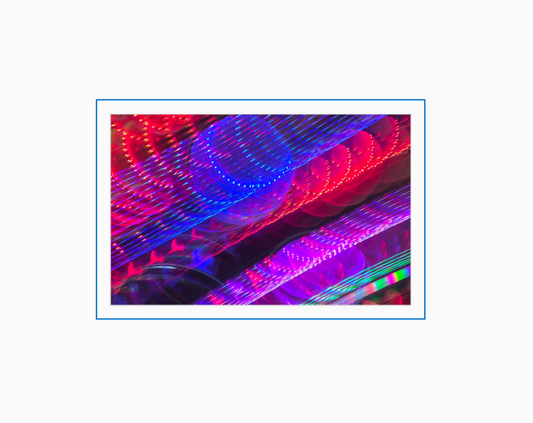 Diffraction grating photograph taken during a day out, rendered with rainbow spectral color streaks.