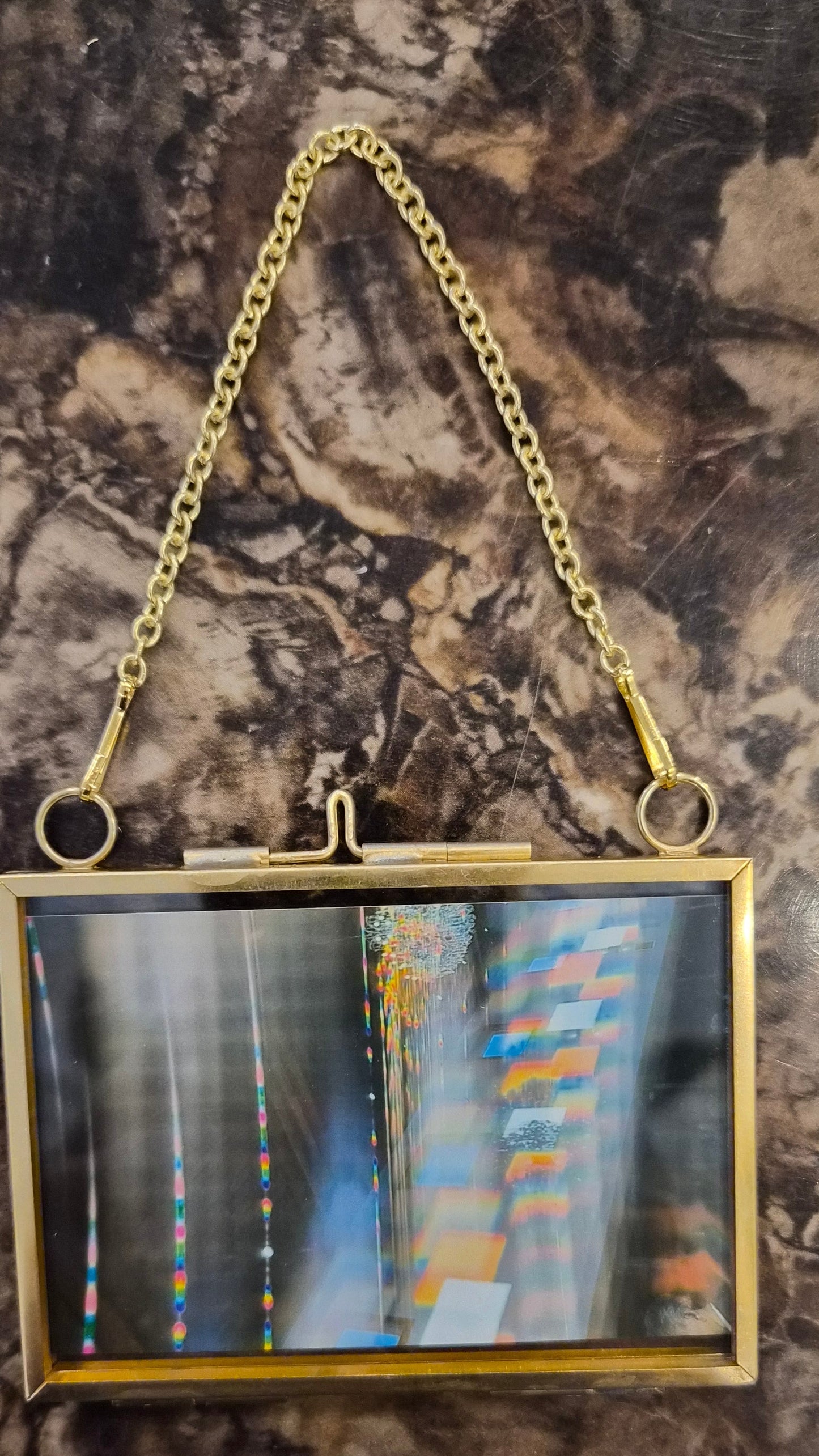 Diffraction photography art print in a locket frame